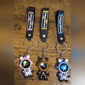 3 pcs Astronaut Keychains.